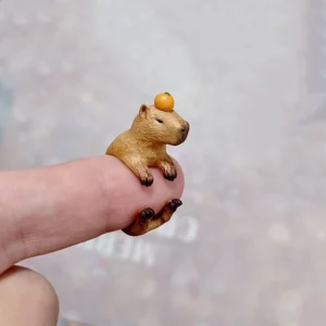 3d harz capybara ring umarmendes finger design mit orange auf dem kopf