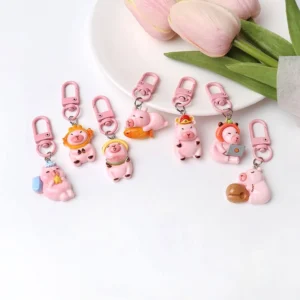 7-teiliges Set Rosa Capybara Anhänger mit Laptop, Wassermelone und Schlaf-Designs