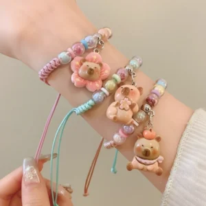 Capybara Armband aus geflochtenem Seil mit schimmernden Acrylperlen und Anhänger in Pastellfarben