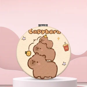 Capybara Kompaktspiegel Motiv Capy-Stapel mit drei übereinander gestapelten Capybaras und Yuzu-Orange