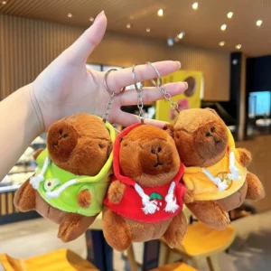 Capybara Plüsch-Schlüsselanhänger im Obst-Themen Hoodie, 10 cm groß
