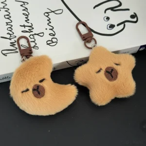 Stern und Mond Capybara Plüsch Schlüsselanhänger - weicher Taschenanhänger mit Capybara Motiv