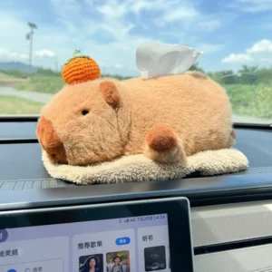 Capybara Plüsch Taschentuchbox auf Auto Armlehne mit orangener Deko