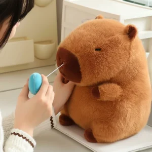 interaktives capybara schnodder plüschtier mit herausgezogener blauer blase