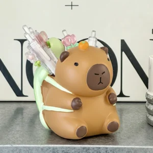 Capybara Stifthalter mit Yuzu Frucht auf dem Kopf Detailansicht