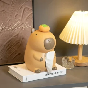 Capybara Taschentuchbox mit Persimone auf dem Kopf
