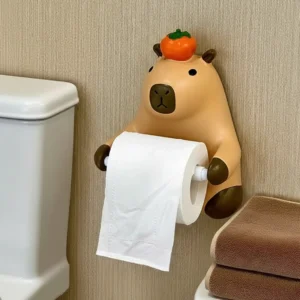 Wandmontierter Capybara Toilettenpapierhalter mit Yuzu-Frucht auf dem Kopf, montiert an Badezimmerwand