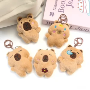 Sammlung von fünf 9 cm großen Capybara Plüsch Schlüsselanhängern mit verschiedenen Emotionen