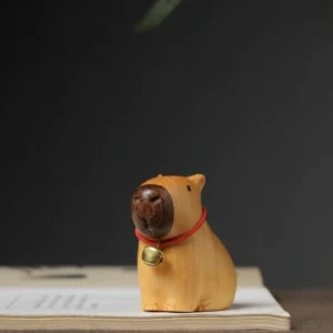 Handgeschnitzte 5cm Capybara Holzfigur aus dunklem Sandelholz mit natürlicher Holzmaserung