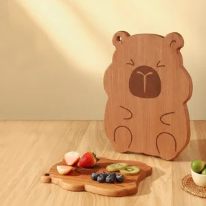 Kleines Capybara Schneidebrett als Servierplatte mit Obst, Capybara Ebenholz Brett