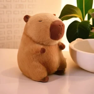 Nahaufnahme Gesicht von weichem Capybara Stofftier mit geschlossenen Augen