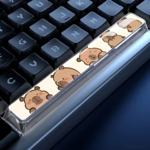 Transparente Capybara Spacebar Tastenkappe mit Design 'Peeking Party', mehrere niedliche Capybaras